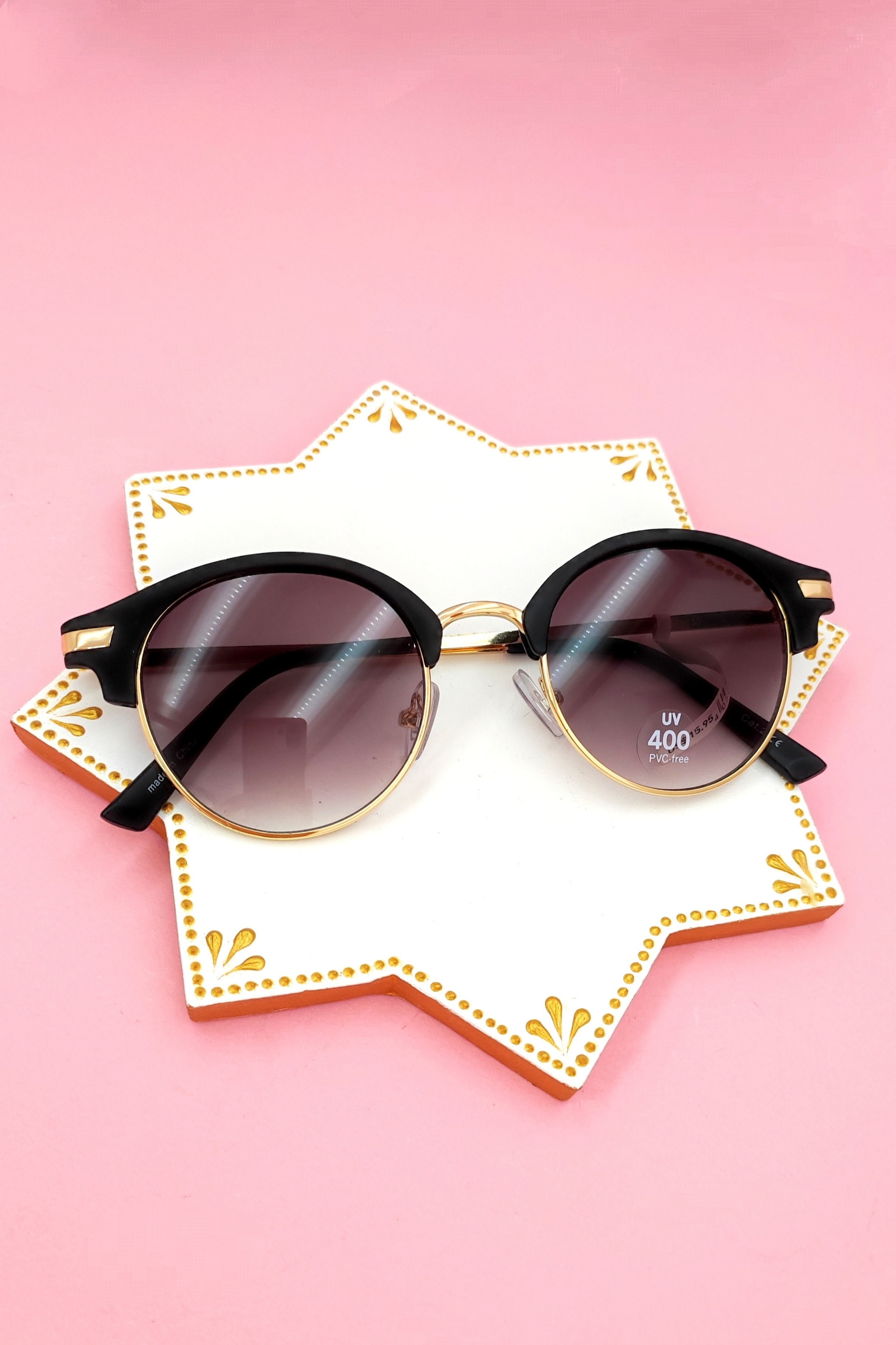 عینک آفتابی اورجینال شیشه گرد طلایی مشکی