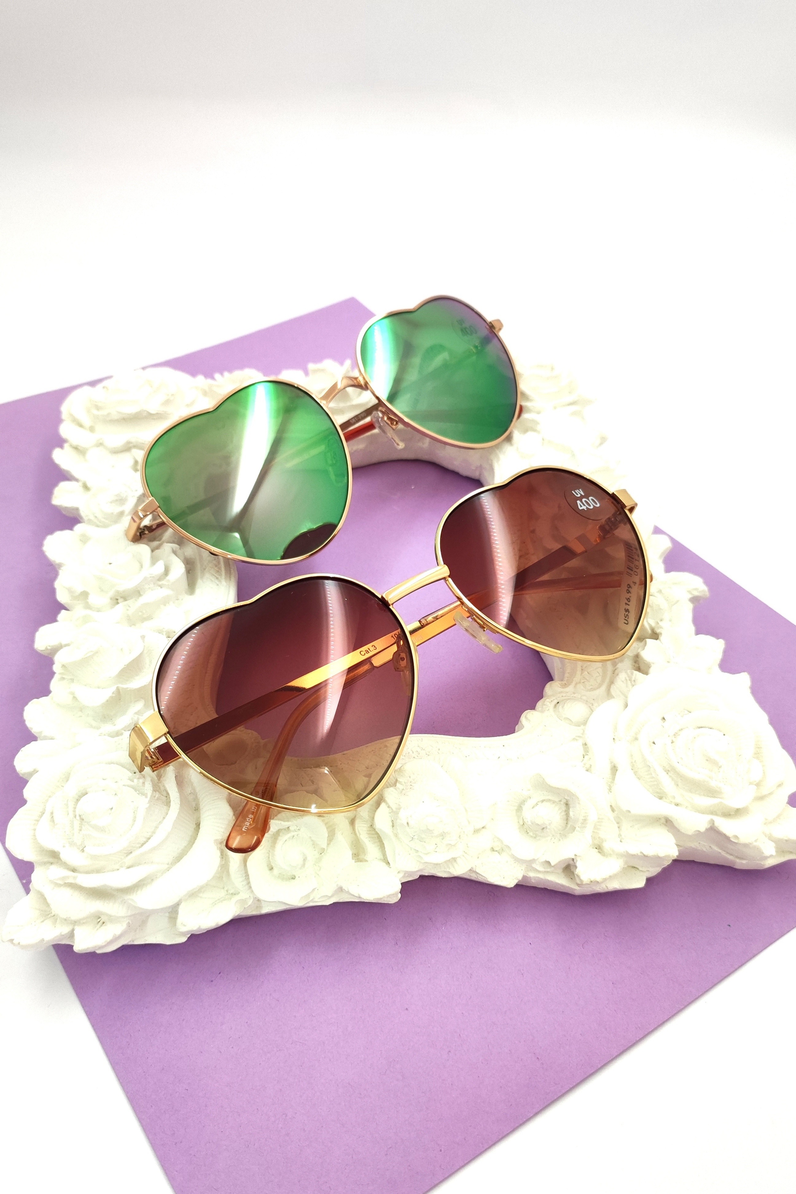 عینک آفتابی و برف اورجینال فلزی قلبی عدسی آینه‌ای رنگ شرابی و سبزصورتی