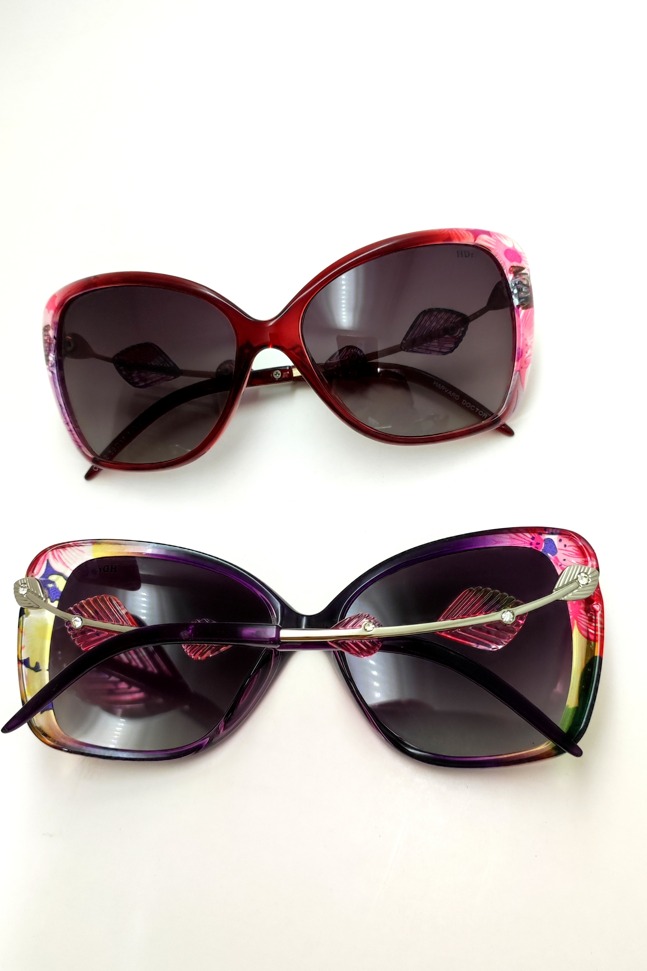 عینک آفتابی اورجینال زنانه گربه‌ای پلاریزه مدل گلدار دسته فانتزی نگین‌دار برند دکتر هاروارد