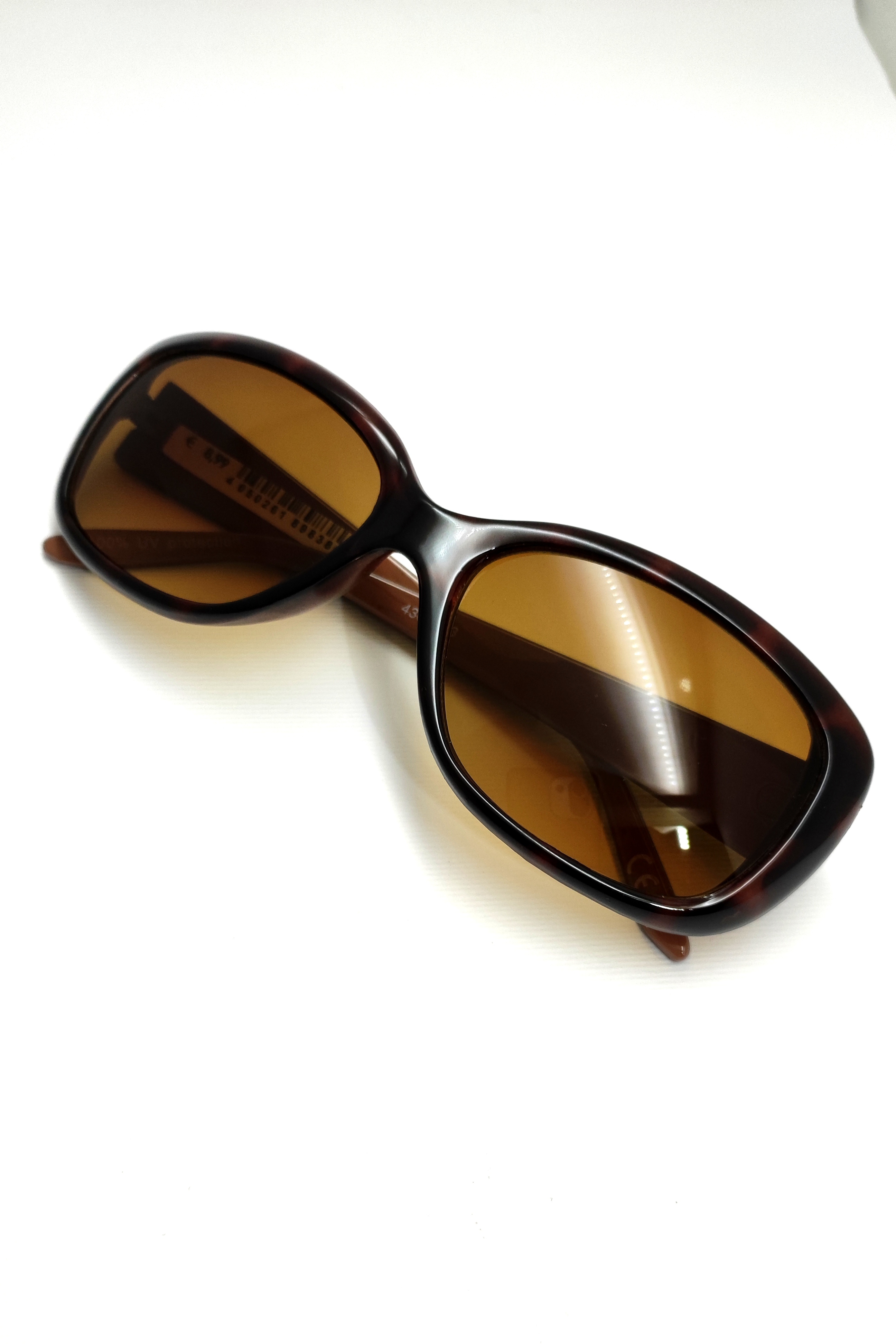 عینک آفتابی اورجینال زنانه بیضی باریک رنگ هاوانا قهوه‌ای پلنگی تیره