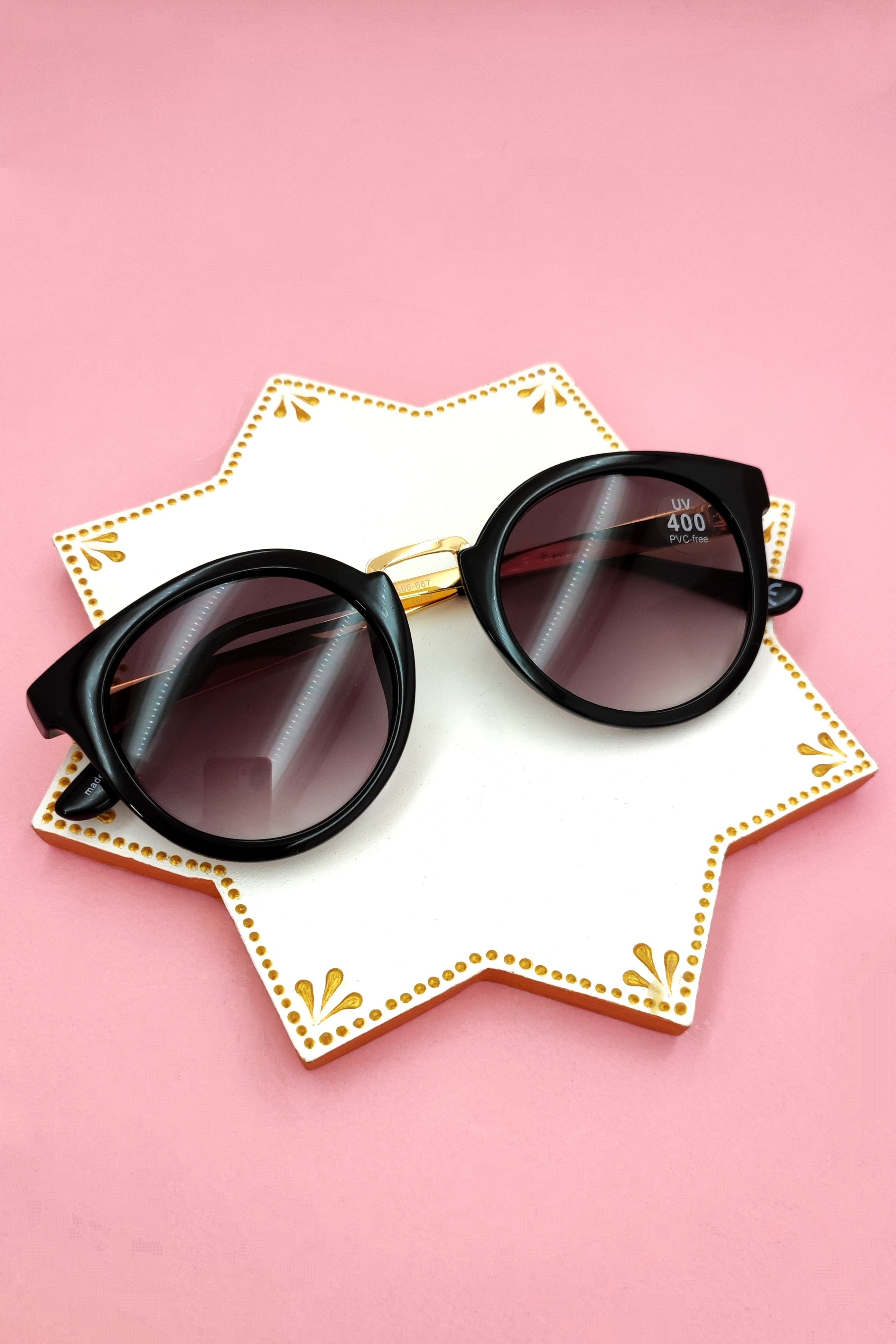 عینک آفتابی اورجینال زنانه و مردانه شیشه گرد دسته فلزی . مناسب صورت‌های بزرگ